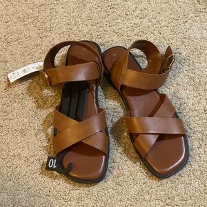 New Brown criss -cross Sandals size 10